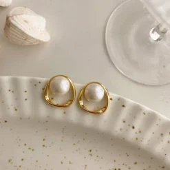 Imitation-Pearl-Earring-for-Women-Gold-Color-Round-Stud-Earrings-Korean-Delicate-Irregular-Design-Unusual-2023-3.webp